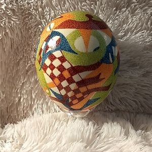 Ostrich egg approximately 6 inches tall.